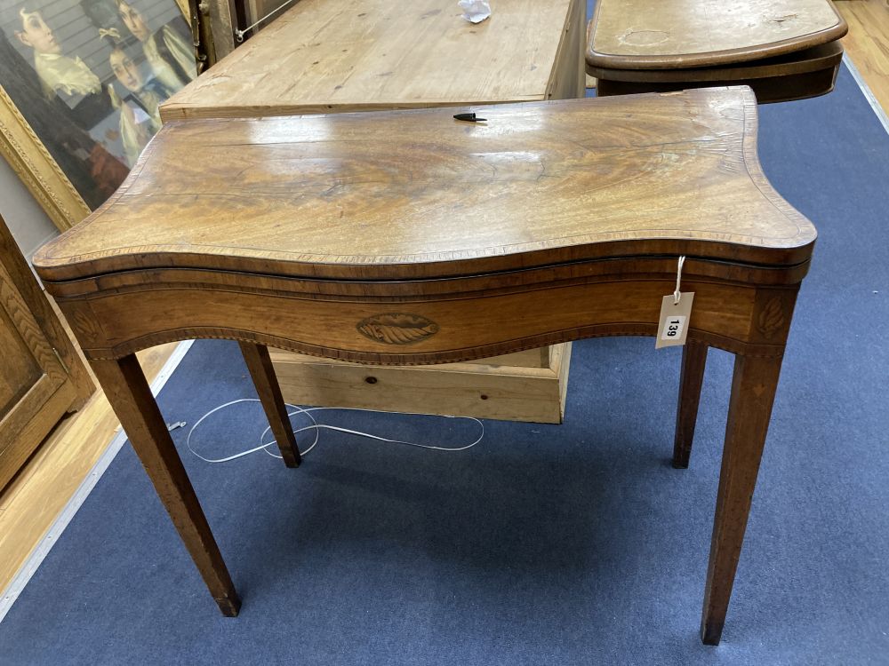 A George III mahogany and satinwood serpentine card table, width 88cm depth 44cm height 76cm